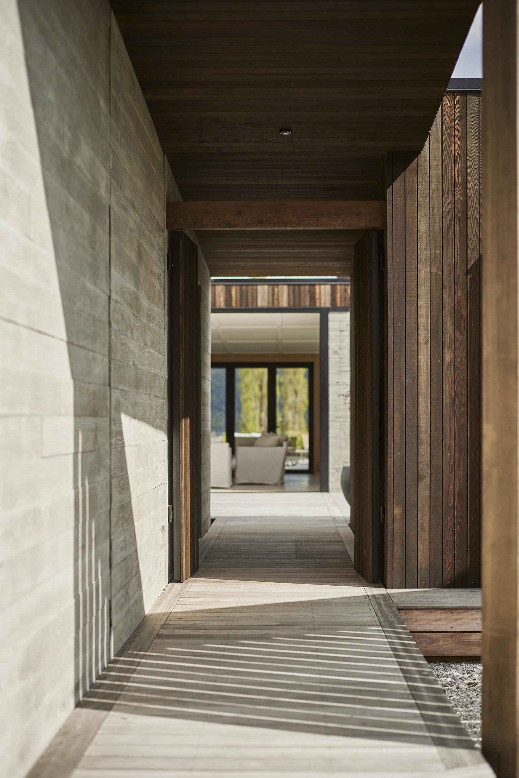 Entry to Living room looking through courtyard BOON
